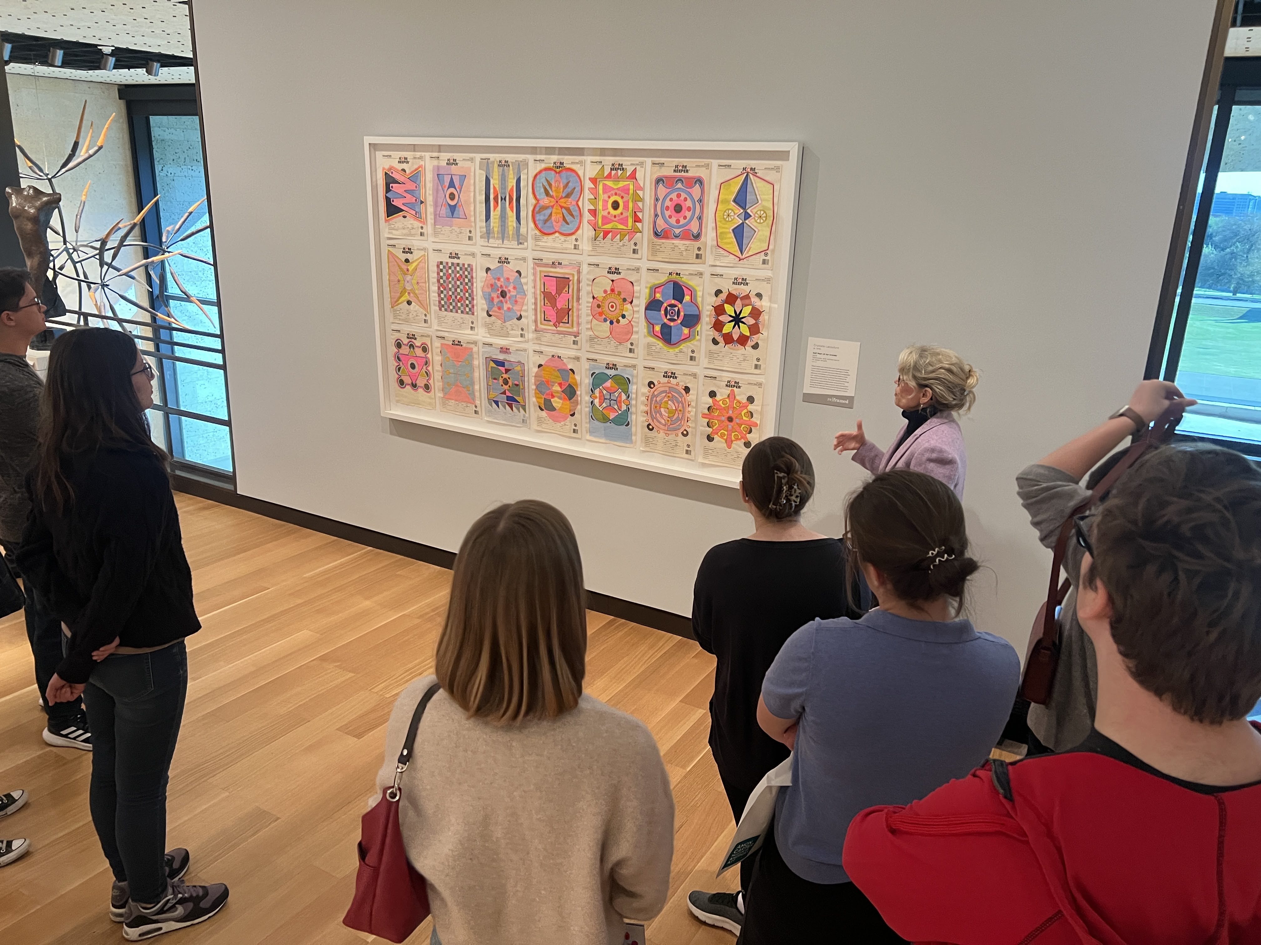 Museum Studies students speaking with curator at the Amon Carter Museum of American Art