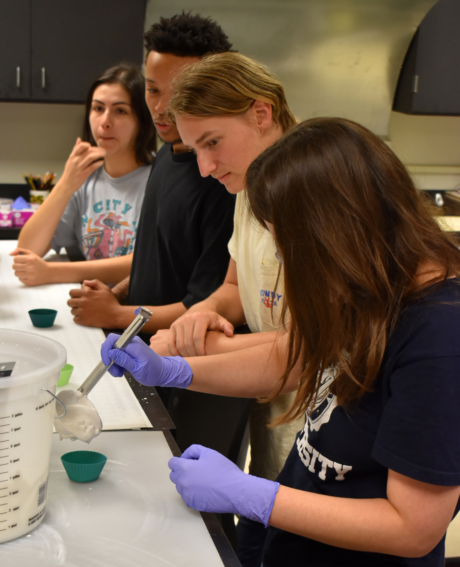 Students do a lab activity for the exhibits development course.